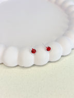 Brinco Ponto de Luz Vermelho