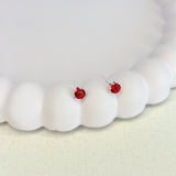 Brinco Ponto de Luz Vermelho