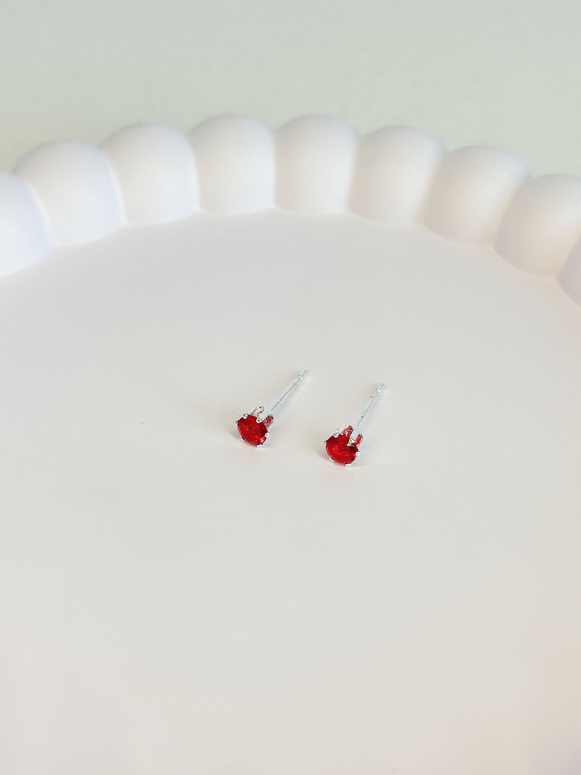 Brinco Ponto de Luz Vermelho