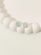 Brinco Oval Azul Claro