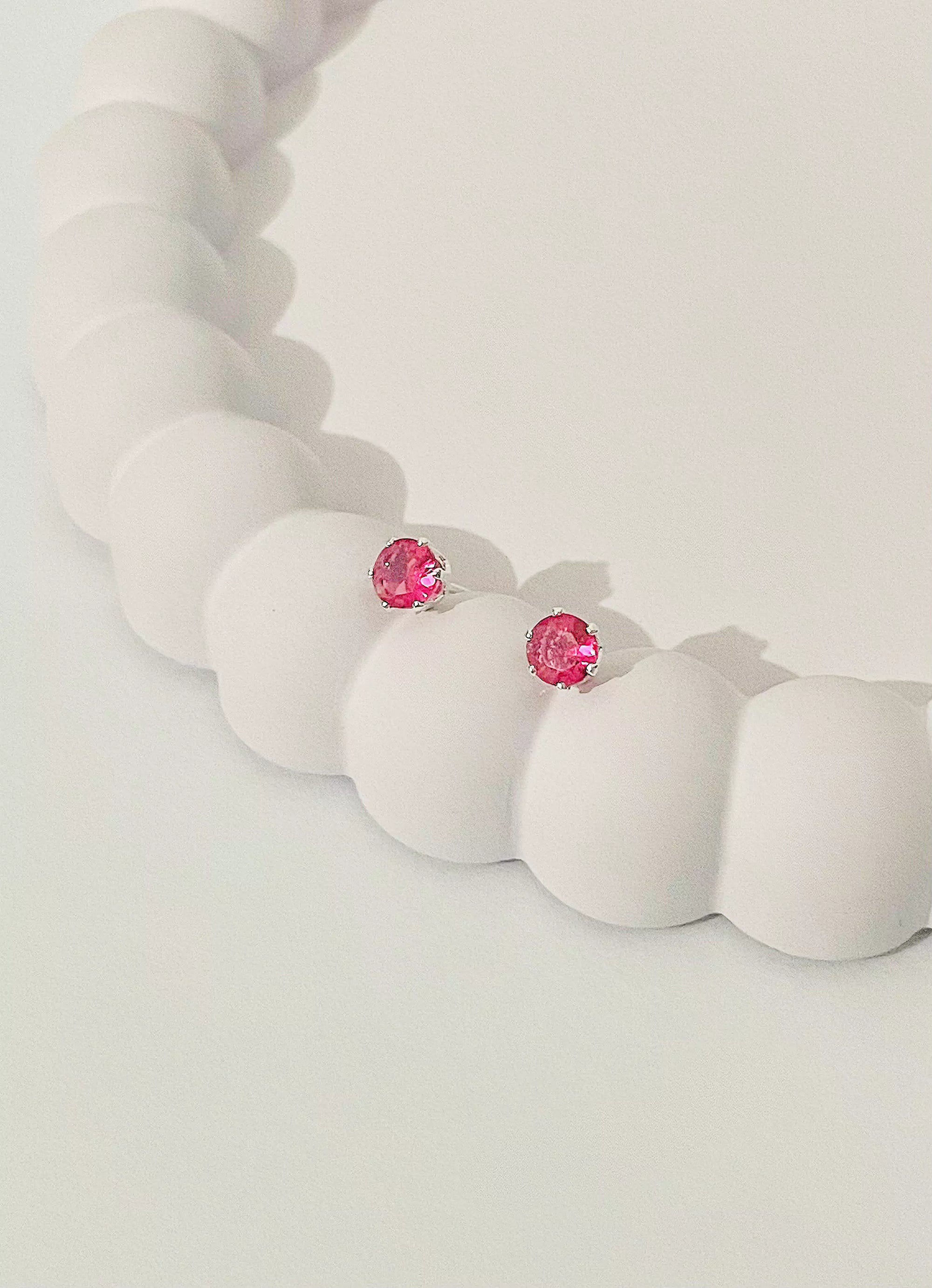 Brinco Ponto de Luz Fucsia